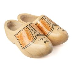 pair of wooden clogs with painted design on the front and back sides, isolated against a white background