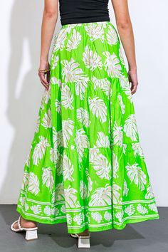 An exquisite woven maxi skirt, adorned with beautiful prints and a comfortable elasticized waistband.. Matching top IT12879Details:Self : 100% CottonSize & Fit- Model is 5`9" And Wearing Size Small- Measurements Taken From Size Small- Approx. Length: 41" Green Flowy Maxi Dress, Green Cotton Maxi Skirt, Vacation Wide Leg Maxi Skirt With Floral Print, Bohemian Green Maxi Skirt For Vacation, Green Cotton Maxi Skirt With Relaxed Fit, Green Cotton Full Maxi Skirt, Green Voluminous Tiered Maxi Skirt, Voluminous Maxi Skirt With Elastic Waistband For Vacation, Casual Green Printed Skirt