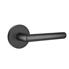 a black handle on a white wall