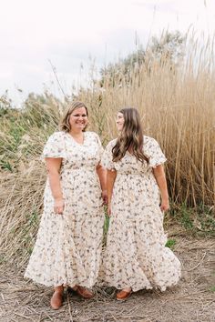 Introducing the Cassia Maxi, the epitome of elegance and sophistication. This cream maxi dress features a beautiful floral print and a flattering v-neckline. The smocked waist cinches in at the perfect spot for a feminine silhouette, while the tiered design adds graceful movement. Complete with flutter sleeves and a full lining for ultimate comfort and luxury. Fits true to size. Model is wearing a large and is 5'6". Plus model is wearing a 2X and is 5'11". Size Chart Length Bust Waist S 54" 34" Modest Maxi Dresses, Cream Maxi Dress, Modest Maxi Dress, Graceful Movement, Tiered Dresses, Modest Maxi, Plus Model, Summer Clearance, Feminine Silhouette