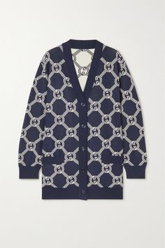 Gucci's cardigan is reversible, featuring a predominantly navy palette on one side and off-white on the other, so you have double the styling options. It's made from soft and insulating wool-blend that's jacquard-knitted with the brand's signature 'GG' emblem. The relaxed fit is perfect for layering.<br><br>Discover how to expertly care for your knitwear <a href="https://www.net-a-porter.com/en-gb/porter/article-2d7c3f487b11919c/fashion/fashion-memo/kn Designer Gucci Jacquard Knit Cardigan, Gucci Jacquard Knit Long Sleeve Cardigan, Gucci Designer Jacquard Knit Cardigan, Gucci Jacquard Knit Cardigan For Fall, Gucci Long Sleeve Jacquard Knit Cardigan, Gucci Casual Blue Sweater, Gucci Designer V-neck Cardigan, Gucci V-neck Winter Outerwear, Casual Gucci Sweater For Work