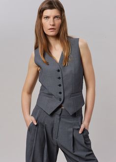 Color: Dark Grey MelangeLightweight traditional suiting fabric Fitted waistcoat Button front closureWelt front pockets Adjustable buckle backLined65% Lyocell 25% Rayon 10% WoolDry CleanBy The Frankie Shop. Imported Minimalist Korean Fashion, Waistcoat Outfit Women, Fitted Waistcoat, Grey Waistcoat, Waistcoat Outfit, Stylish Work Attire, The Frankie Shop, Suiting Fabric, Frankie Shop