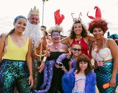 a group of people dressed up in costumes