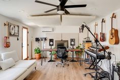 a living room filled with furniture and musical instruments