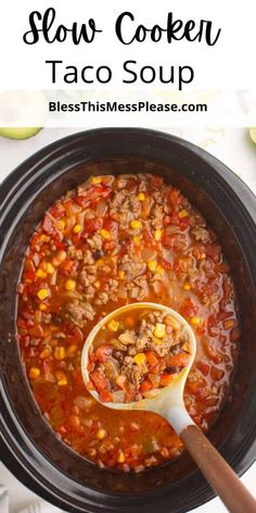 slow cooker taco soup in a crock pot with a ladle scooping out