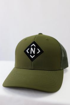 Special for all you Nashville locals, the Iconic Trucker is a stylish nod to the logo that we are known for! Features embroidered NASH curved above the snapback. Unisex Hard buckram. Structured Black plastic snapback closure Matching undervisor, 8-row stitching on visor Black Plastic, Nashville, The Row, Baseball Hats, Stitching, ? Logo, Hats, Black, Cross Stitching