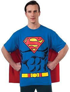 a man wearing a superman t - shirt with his hands on his hips