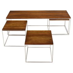 three wooden tables sitting next to each other on top of a white surface with metal legs