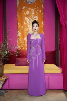 Indulge in luxury with our Ao Dai. The soft velvet and elegant satin fabric create a sophisticated A-line silhouette. The long sleeves add a touch of modernity, making it perfect for any special occasion. Embrace elegance and make a statement with this exclusive piece. Length: 150cm (Ao Dai), 110cm (Pants) Long Sleeve Couture Evening Dress For Gala, Long Sleeve Evening Dress With Fitted Bodice For Cocktail, Cocktail Evening Dress With Fitted Bodice And Long Sleeves, Cocktail Evening Dress With Long Sleeves And Fitted Bodice, Couture Long Sleeve Evening Dress For Gala, Couture Long Sleeve Evening Dress, Luxury Long Sleeve Satin Evening Dress, Festive Long Sleeve Gala Evening Dress, Luxury Long Sleeve Festive Evening Dress