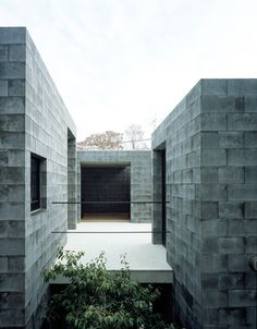 an open courtyard with concrete blocks on the sides