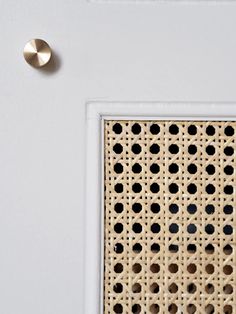 a close up of a door with holes in it