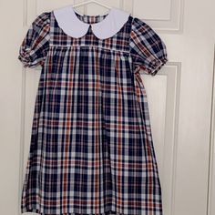 Nwot Beaufort Bonnet Company Red And Blue Plaid Dress With White Peter Pan Collar. Adorable Plaid That Is Perfect For Memorial Day, Labor Day 4th Of July Or Family Pictures. Size 8, But Easily Could Work For Size 6-10. Perfect For Back To School Too! Such A Classic Dress. Monogram On The White Peter Pants Collar Would Be Adorable. Preppy Red Cotton Dress, Red Preppy Cotton Dress, Navy Short Sleeve School Dress, Plaid Short Sleeve Dress For School, Red Short Sleeve School Dress, Preppy Short Sleeve Dresses For School, Preppy Short Sleeve School Dress, Fitted Blue Preppy Dresses, Preppy Blue Dresses For School