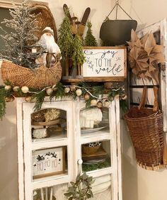 an old cabinet is decorated with christmas decorations