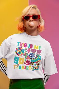 Step Back in Time with Our "This is my 90's T-Shirt" Digital Design! Get ready to relive the vibrant, fun-filled era of the 90's with our exclusive digital t-shirt design! This colourful masterpiece features iconic images that defined a generation: rollerblades, funky sunglasses, a nostalgic cassette tape, and even a retro cubic block. Bursting with bright hues and playful energy, this design captures the essence of 90's pop culture. Perfect for those who want to add a touch of nostalgia to thei 90 Art, Style 90's, Fashion Png, Funky Sunglasses, Iconic Images, 90's Fashion, Cassette Tape, Mode Vintage, Retro Design