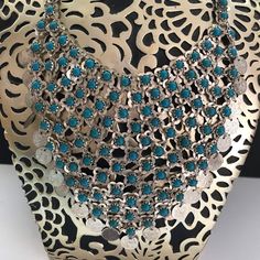 "ON SALE Very nice FAUX turquoise aqua blue beaded Silvertone metal large bib statement necklace and matching dangle drop brooch both are in very good vintage condition. Has a hook for a clasp on the necklace. Necklace measures 17 1/2 inches long and the big portion is 6 x 6\". The brooch is 3 inches long by 2 inches wide. A fun dramatic look perfect for any retro BoHo or any kind of outfit." Vintage Blue Turquoise Necklace Nickel Free, Blue Vintage Necklace For Festival, Blue Bohemian Bib Necklace, Vintage Blue Turquoise Metal Necklace, Vintage Blue Choker Necklace, Vintage Turquoise Necklace In Metal, Handmade Turquoise Metal Necklace, Handmade Metal Turquoise Necklace, Vintage Blue Beaded Turquoise Necklace