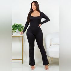 Long Sleeve Spandex Jumpsuit With Bell Bottoms Style Black Stretch Jumpsuits And Rompers In Elastane, Stretch Elastane Jumpsuits And Rompers For Night Out, Stretch Elastane Jumpsuit For Night Out, Sleek Black Elastane Jumpsuits And Rompers, Black Elastane Jumpsuits And Rompers For Work, Fitted Elastane Jumpsuits And Rompers For Work, Black Elastane Jumpsuit For Work, Fitted Elastane Jumpsuits For Work, Black Elastane Jumpsuits For Workwear