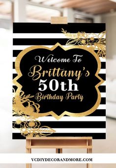 a black and gold 50th birthday party sign