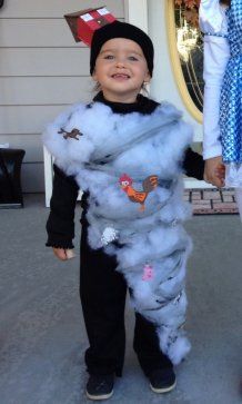 two children dressed up in costumes for halloween