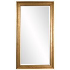 a gold framed mirror on a white wall