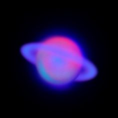 a blurry image of the planet saturn