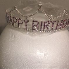 a tiara that says happy birthday on it