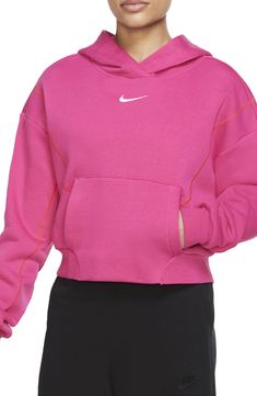 The oversized silhouette and cozy fleece of this sporty hoodie make it perfect for wearing to the gym or just kicking back for the weekend. Fixed hood 80% cotton, 20% polyester Machine wash, tumble dry Imported Nordstorm x Nike