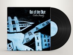 the album cover for out of the blue, featuring an image of buildings and a bridge