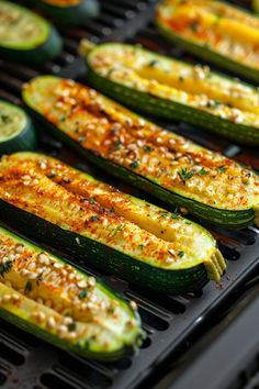 Grilled zucchini halves with spices and herbs on a grill. Air Fryed Squash And Zucchini, Air Fry Squash And Zucchini, Air Fried Squash And Zucchini, Air Fryer Zucchini And Squash, Zucchini Air Fryer, Crispy Squash, Zucchini And Yellow Squash Recipes Grill, Grill Zucchini And Squash, Squash Chips