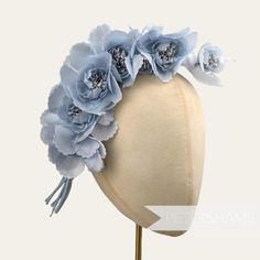 Just, wow! This large light blue silk flower branch is made up of 8 delicate flowers with smaller blooms mixed in. It's tiered shape means it is simply perfect for mounting onto a headband to make an instant fascinator or bridal headpiece! Made from a mixture of silk and organza fabric, each petal has a gentle scallop lending to a sweet yet modern feel. Try adding one onto the side of a headband for an instant glamorous fascinator. For even more drama mount one on either side of a headband for a Sinamay Fabric, Coquille Saint Jacques, Millinery Supplies, Organza Flowers, Velvet Flowers, Feather Flower, Flower Branch, Canterbury, Flower Hats