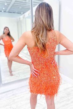 This short tight orange homecoming dress features one shoulder, feather and sequined. The feather decoration on the skirt makes the skirt look elegant and noble. *Shown Color: As pictured Please email me if you want any other colors. *Time: Processing Time + Shipping TimeProcessing Time: 10-15 days; Shipping Time: 3-5 days.If you need this product urgently, or have any questions,please contact our customer service through our live chat or email: contact@modcody.com *Size: Besides stand size 2-16 Orange Hoco Dress With Feathers, Orange Hoco Dress, Feather Homecoming Dress, One Shoulder Homecoming Dress, Feather Outfit, Orange Homecoming Dresses, Tight Homecoming Dress, Mini Homecoming Dress, Dress With Feathers