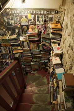 the stairs are full of books and magazines