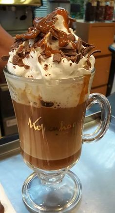 a cup filled with chocolate and whipped cream