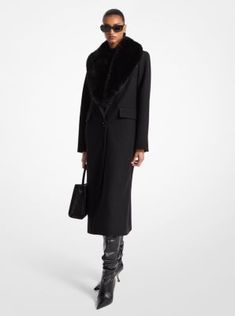 The classic wool coat is instantly updated with a removable faux fur collar for added warmth. It showcases a longline silhouette complete with a two-button fastening and pockets. Wear it over a short dress to keep it in focus. In Focus, Wool Blend Coat, Faux Fur Collar, Faux Fur Coat, Fur Collar, Fur Collars, Black Coat, Wool Coat, Long A Line