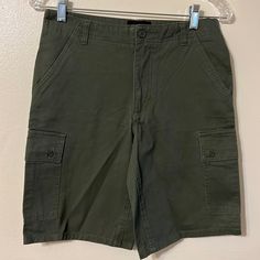 This Is A New With Tag Hurley Cargo Short. Color - Green 2 Side Pockets 2 Cargo Pockets With Button Closure And Flap 2 Back Pockets With Button Closure And Flap Waist - 30" Length - 18" Inseam - 10" Rise - 10" 100% Cotton Machine Wash Green Cotton Cargo Shorts, Green Cotton Cargo Shorts With Belt Loops, Casual Short Cargo Shorts With Belt Loops, Green Bermuda Shorts With Pockets, Casual Green Cargo Shorts, Casual Cotton Cargo Shorts With Short Inseam, Casual Cargo Shorts With Short Inseam, Green Casual Cargo Shorts, Casual Green Short Length Cargo Pants