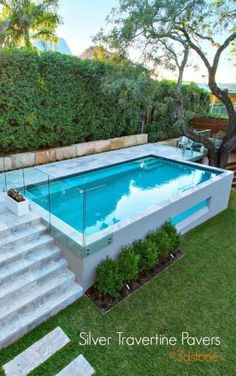 an above ground swimming pool with steps leading up to it