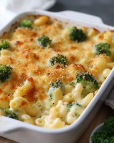 a casserole dish with broccoli and cheese