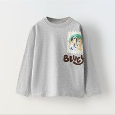 Zara Baby Kids Toddler Girls Boy Bluey Bingo Ludo Studio Patch Tee Size 2-3y 3-4y Nwt T-Shirt With Round Neck And Long Sleeves. Bluey Ludo Studio Embroidered Patch At Chest. Zara Kids Baby, Gap Outfits, Bluey Bingo, Zara Boys, Patches Shirt, Oversized Knit Cardigan, Zara Baby, Zara Shirt, Latest T Shirt