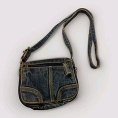 This denim crossbody bag is a stylish and practical accessory for any outfit. See photos for measurements Note some light stains on the striped inner part near the top Denim Jean Purses, Denim Crossbody Bag, Jean Purse, Denim Crossbody, Denim Purse, Card Bag, Women Accessories Bags, Denim Jean, Cross Body Handbags