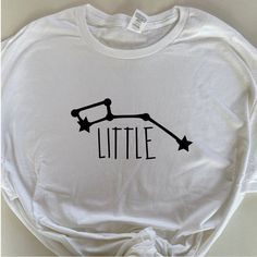 Big Little Reveal Shirt! IF THIS IS FOR A BIG LITTLE REVEAL PLEASE INCLUDE THE DATE OF THE REVEAL SO I CAN MAKE SURE YOUR ORDER ARRIVES TO YOU ON TIME! My turnaround time for big little shirts is about 1-3 days, but I can rush process your order for no extra cost- just message me :) Upon ordering please message me the following: - T-shirt color - Decal Color - Wording on the shirt (big, biggie, little, lil, g big, etc...) If there is any other specific customization you would like but do not see Cute Big Little Reveal Themes, Big Little Themes, Big Little Reveal Themes, Big Little Shirts Sorority, Big Little Reveal Shirts, Sorority Reveal Shirts, Big Little Sorority Shirts, Sorority Clothing, Big Little Basket