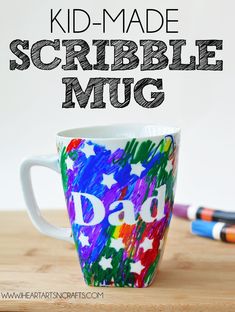 a coffee mug with the words, kid - made scribble mug on it