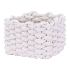 a white woven basket on a white background