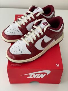 Size 7.5  Nike Dunk Low Premium Vintage Red W FJ4555-100  New with defects Shoes have barely visible scuff on the side Box has no Lid, please check photos Classic Red Sneakers With Perforated Toe Box, Classic Skate Shoes With Red Sole And Round Toe, Classic Skate Shoes With Red Sole, Nike Skate Shoes With Red Sole, Nike Skate Shoes With Red Sole And Round Toe, Side Box, Athletic Shoes Nike, Dunks Nike, Nike Dunk Low