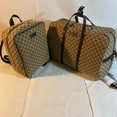 Beautiful Duffle Travel Bag And Square Book-Bag By Gucci. Crafted In Beige Monogram Canvas. Duffle Bad Still Has Original Wrapping And Book-Bag Has Original Packaging On The Inside. Never Worn! Brand New! Please Check The Photos Carefully And Ask If You Need To Know More Details Or If You Have Any Questions Please Feel Free To Contact Me. Receipt Can Be Shown As Well. High-end Travel Backpack Shoulder Bag, Designer Duffle Bag For Daily Use, Luxury Monogram Canvas Duffle Bag, Designer Travel Bag With Removable Pouch, Designer Rectangular Travel Bag For Shopping, Designer Travel Bag With Top Carry Handle, Designer Travel Bag With Removable Pouch For Everyday, Designer Travel Bag With Removable Pouch For Daily Use, Designer Rectangular Travel Bag With Removable Pouch