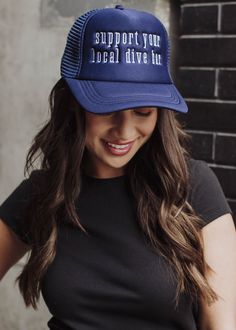 Navy trucker hat White "Support your local dive bar" embroidered on the front Adjustable snapback closure Breathable mesh Funny Trucker Hat, Women Trucker, Knitted Hats Kids, Knit Hat For Men, Hat Day, Dive Bar, Romper And Jacket, Day Drinking, Blouse Tank Top