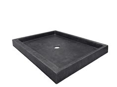 a black square shower tray with an open hole in the center on a white background