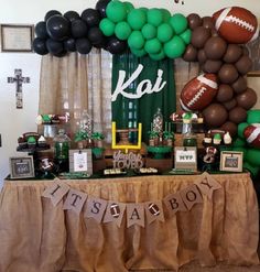 a football themed party with balloons and decorations