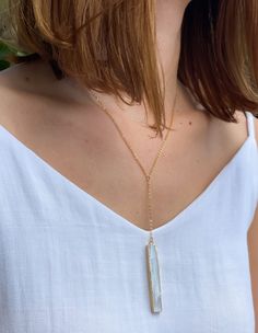 This delicate necklace features a natural selenite crystal wand, 14k Gold Plated dainty 925 Silver chain. Selenite is a calming stone that instills deep peace and is excellent for meditation or spiritual work.

 	Chain: 18K Gold Plated Sterling Silver
 	
Closure: Lobster claw
 	
Style: Boho & Minimalist
 	Model is pictured wearing 18" Selenite Crystal Wands, Feminine Symbols, Selenite Necklace, Spiritual Work, Boho Minimalist, Selenite Crystal, Crystal Wand, Healing Jewelry, 925 Sterling Silver Chain