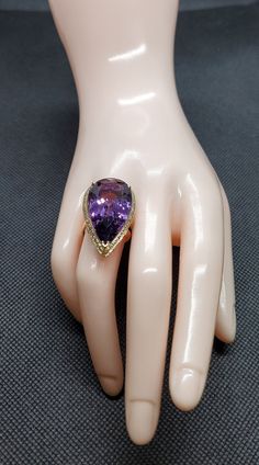 14k solid yellow & white gold ring with 0.60 ct. SI1, G color natural brilliant diamonds & 19.20 ct. 26x15 mm pear shape natural AAA amethyst. This item can also be ordered in white, rose or any other color gold combination with different color gemstones such as, blue topaz, London blue topaz, green amethyst, pink amethyst, citrine, garnet, smoky quartz, white topaz, aquamarine, peridot & morganite. Please contact me for a quote as each gemstone varies in price. Please don't hesitate Elegant Teardrop Amethyst Ring For Formal Occasions, Formal Teardrop Amethyst Ring, Formal Teardrop Amethyst Ring In Fine Jewelry Style, Formal Pear-shaped Amethyst Ring With Prong Setting, Elegant Pear-shaped Amethyst Ring For Formal Occasions, Elegant Formal Pear-shaped Amethyst Ring, Two Tone Ring, Satin Bags, Pink Amethyst