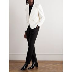 A white blazer is ideal to wear with the colourful shirts you've reserved for sunnier months. SAINT LAURENT's version has been tailored in Italy from wool-gabardine that's both comfortable and breathable. It's designed with sharp peak lapels and lightly padded shoulders to create the illusion of broader proportions. Small to size. See Size & Fit notes. Designer White Blazer For Semi-formal Occasions, White Single Button Luxury Blazer, Luxury White Single Button Blazer, Modern White Single Button Blazer, White Luxury Single-button Blazer, White Blazer With Pressed Crease For Work, Modern Fitted White Suits, Luxury White Business Blazer, Tailored Timeless White Suit