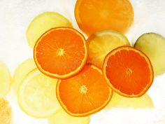 sliced oranges and lemon slices on white background royalty photo - image 397982